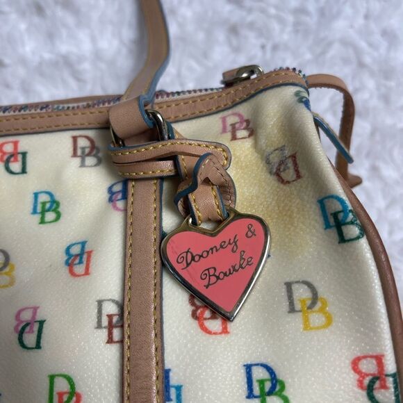 Dooney & Bourke PVC Multi color logo Bagette shoulder bag. Tan leather trims - Picture 7 of 16